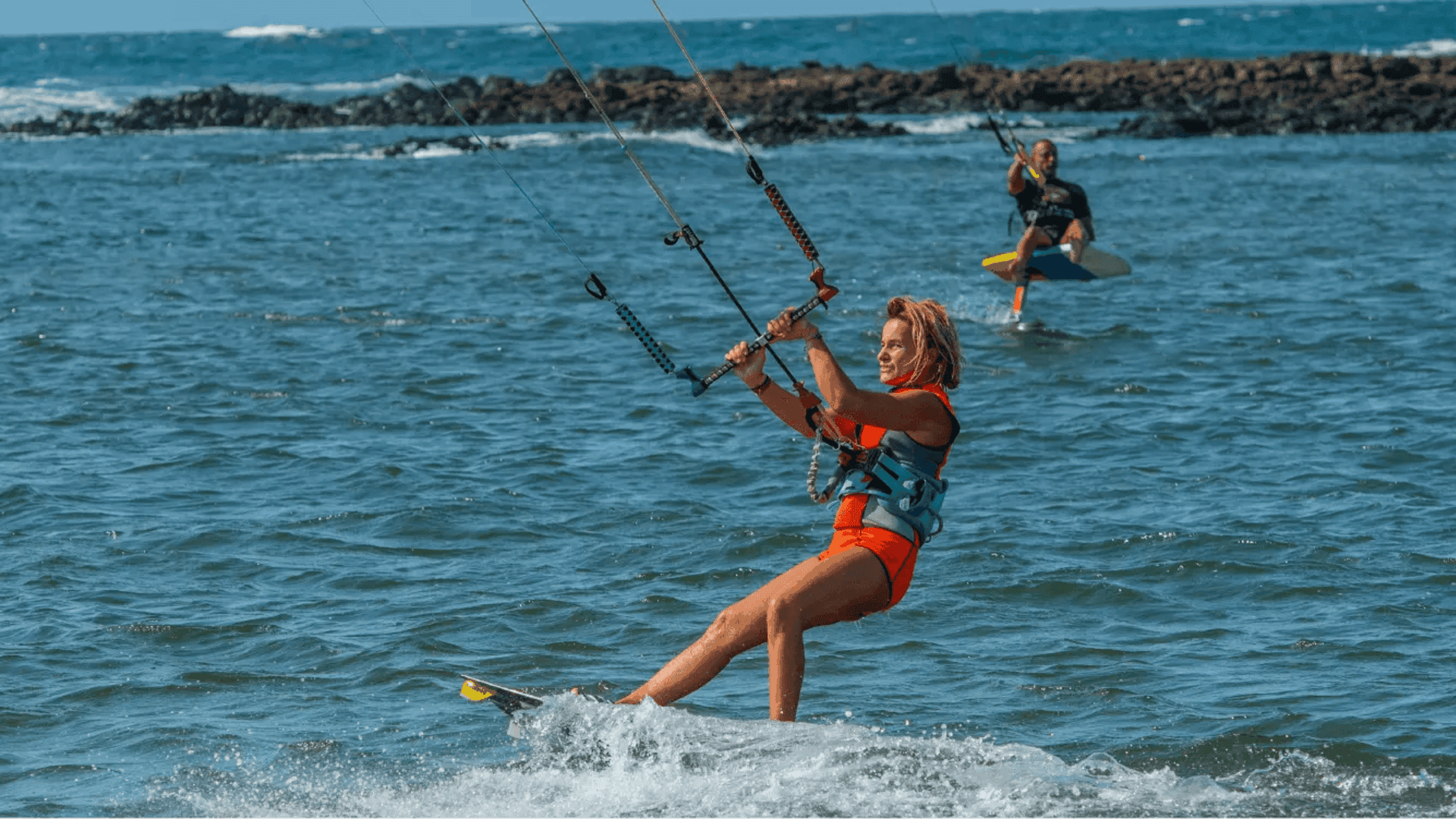 A-woman-kite-surfing-at-west-beach