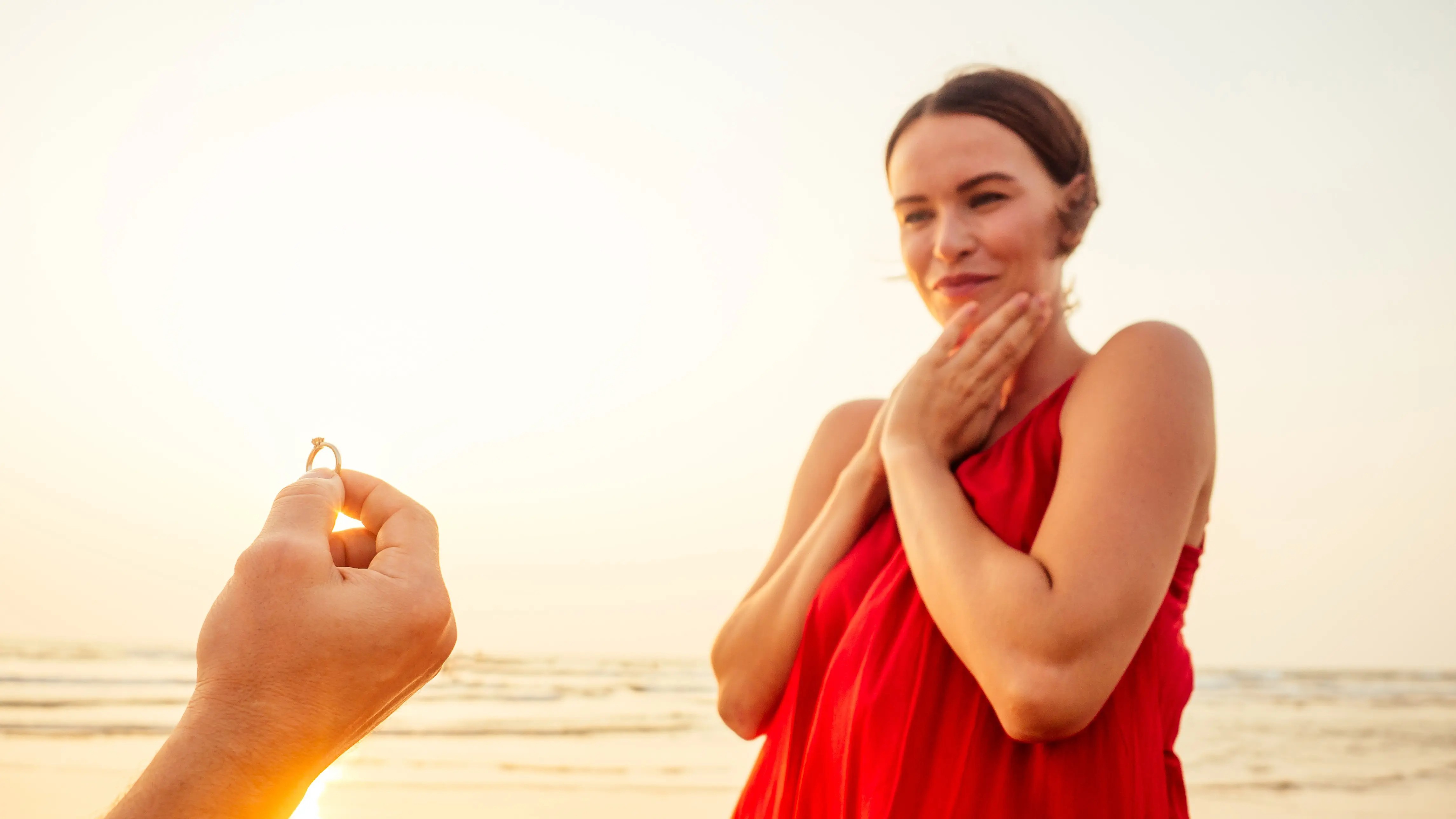 Proposing a Girlfriend on the Beach with an Engagement Ring